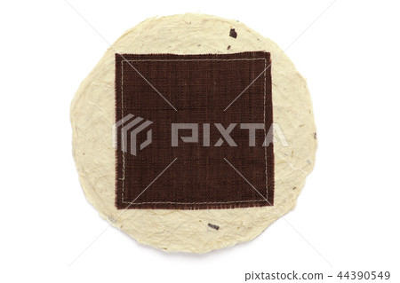 Round Japanese paper on brown cloth 44390549