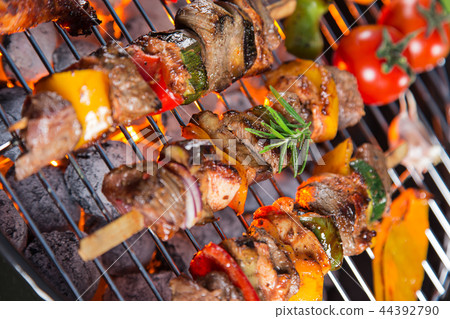 Barbecue grill with tasty skewers, close-up. 44392790