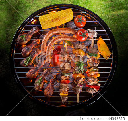 Barbecue grill with tasty skewers, close-up. 44392813