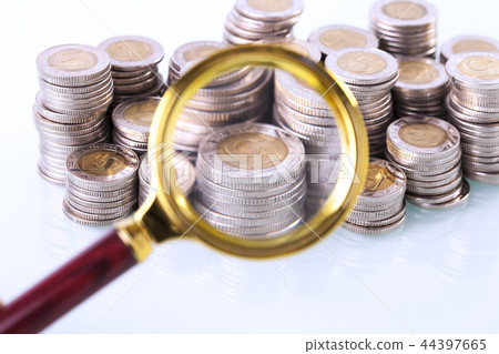 Money under loupe. Zoom on home finances Money under loupe. Zoom on home finances 44397665