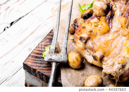 Baked meat with forest mushrooms Baked meat with forest mushrooms 44397883