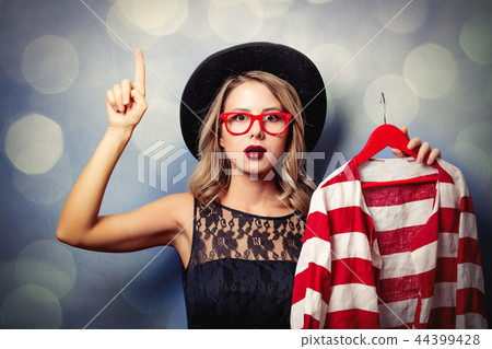 style girl with jacket on hanger style girl with jacket on hanger 44399428