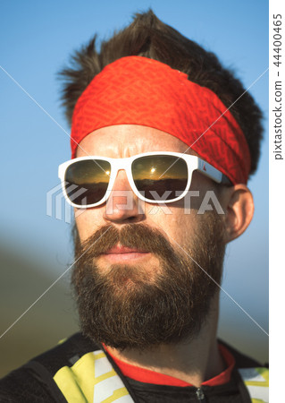 Portrait of young sporty mountaineer man Portrait of young sporty mountaineer man 44400465