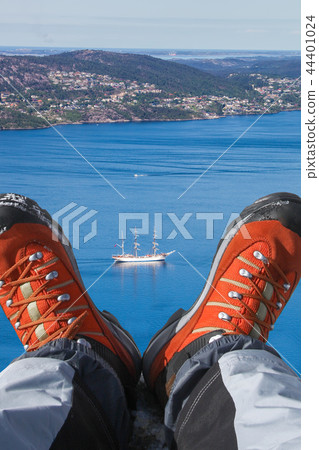 Ship with hiking boots in fjord, Bergen, Norway Ship with hiking boots in fjord, Bergen, Norway 44401024