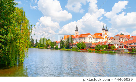 Telc Panorama. Water reflection of houses and Telc Castle, Czech Republic. UNESCO World Heritage 44406029