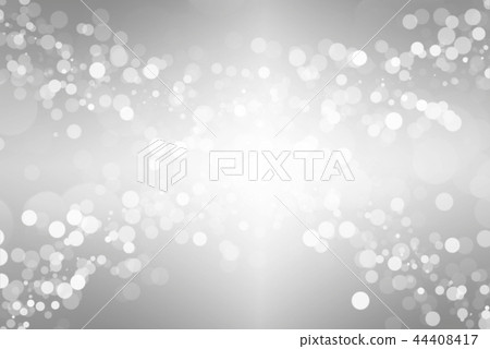 The bokeh on the blurred natural gray background. The bokeh on the blurred natural gray background. 44408417