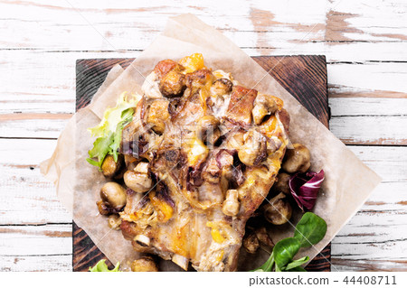 Baked meat with forest mushrooms Baked meat with forest mushrooms 44408711