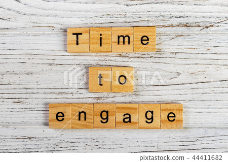 time to engage word made with wooden block concept 44411682