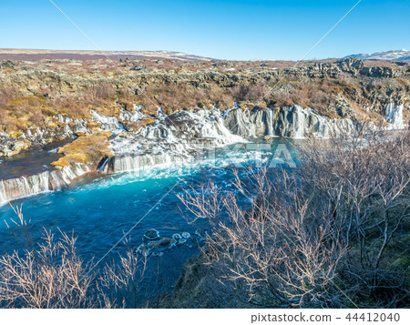 Hraunfossar waterfall in Iceland Hraunfossar waterfall in Iceland 44412040