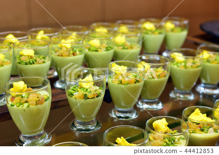 pistachio souffle with raisins in portion glasses pistachio souffle with raisins in portion glasses 44412853