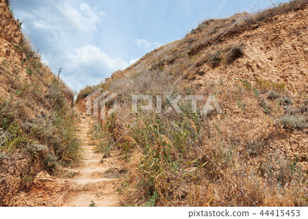 path near the high sea shore, beautiful coastal 44415453
