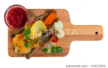 Roasted partridge with cranberry sauce Roasted partridge with cranberry sauce 44423004