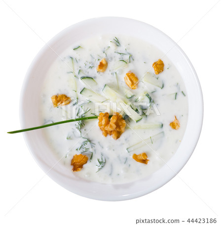 Top view of Bulgarian soup Tarator on wooden background 44423186