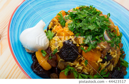 Pilaf from lamb, prunes, dried apricots Pilaf from lamb, prunes, dried apricots 44423517