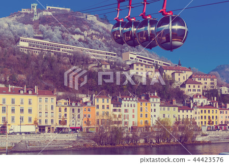 Aerial view of Grenoble with French Alps and cable car 44423576