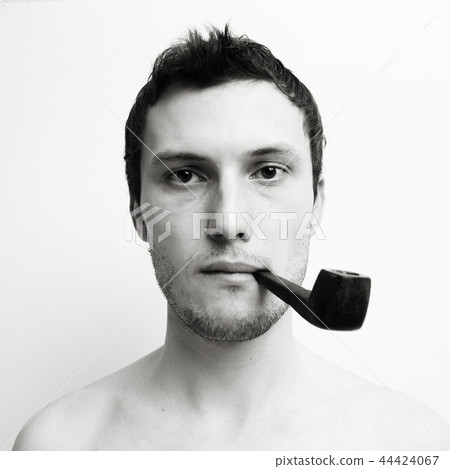 Young attractive man with tube Young attractive man with tube 44424067