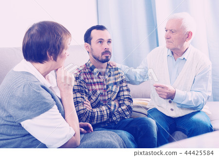 Grandparents and grandson serious talk Grandparents and grandson serious talk 44425584