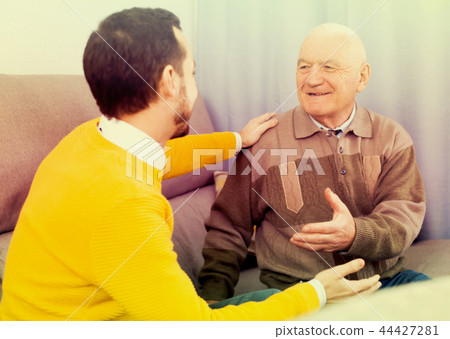 Old father and son friendly conversation Old father and son friendly conversation 44427281