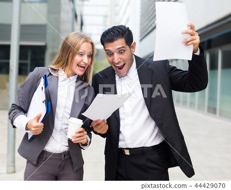 Businessman and his boss woman are signed successful contract Businessman and his boss woman are signed successful contract 44429070