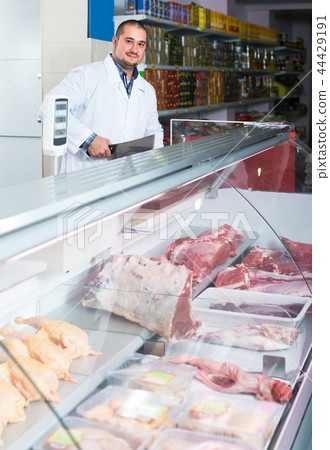 Portrait of male butcher in kosher section at supermarket 44429191