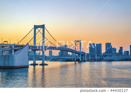 Tokyo Japan, sunset skyline Odaiba Rainbow Bridge 44430137