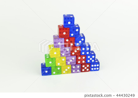 Colorful pyramid of neatly stacked game dice Colorful pyramid of neatly stacked game dice 44430249