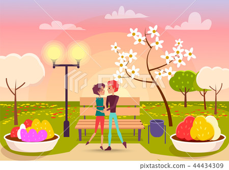 Couple Looks Eyes to Eyes in Park near Streetlight 44434309