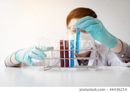 Young asian man medical researcher looking test tu Young asian man medical researcher looking test tu 44436254