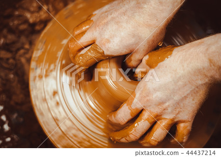 Potter makes a jug 44437214