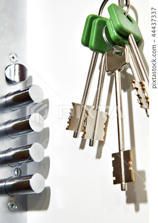 Door chubb detector lock and key isolated on white Door chubb detector lock and key isolated on white 44437337