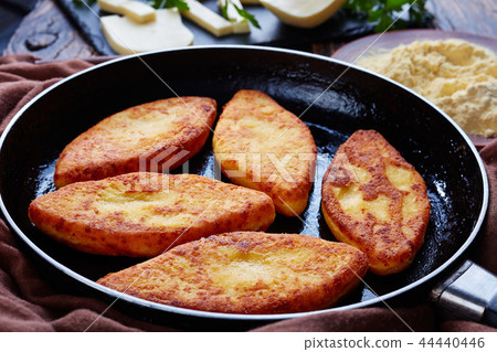 close-up of hot fried cornbread pancakes 44440446