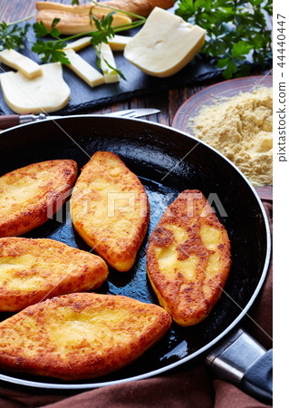 close-up of tasty fried cornbread pancakes 44440447