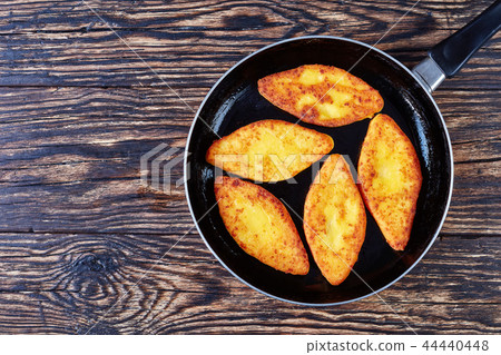 delicious fried cornbread pancakes, flat lay delicious fried cornbread pancakes, flat lay 44440448