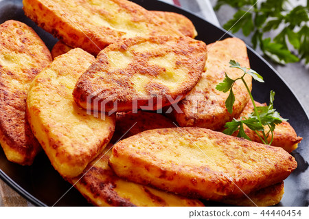 Chvishtari served on a black plate 44440454