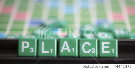 letter green scrabble is spelling word PLACE. letter green scrabble is spelling word PLACE. 44441372