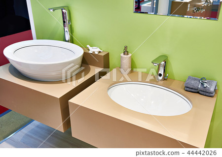 Modern washbasin, faucets, bathroom and toiletries 44442026
