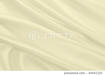 Smooth elegant golden silk or satin luxury cloth Smooth elegant golden silk or satin luxury cloth 44442183