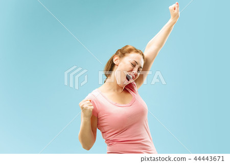 Winning success woman happy ecstatic celebrating being a winner. Dynamic energetic image of female Winning success woman happy ecstatic celebrating being a winner. Dynamic energetic image of female 44443671