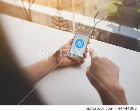Woman hand holding mobile phone Woman hand holding mobile phone 44444869
