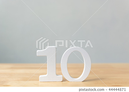 Number ten wooden material on table Number ten wooden material on table 44444871