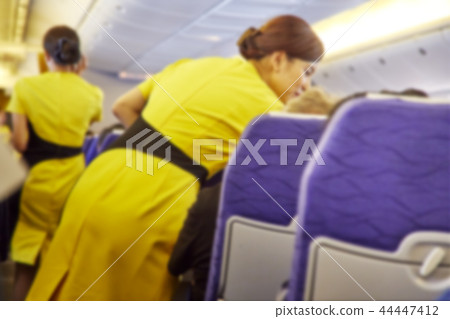Blurred Flight serving passengers 44447412