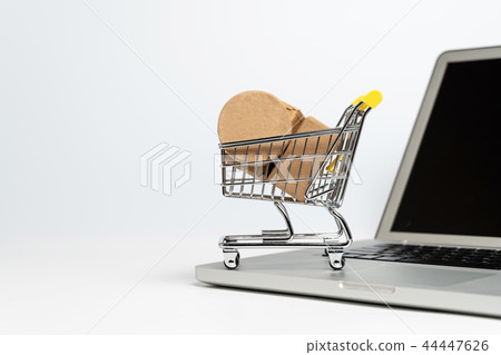 PC and shopping cart PC and shopping cart 44447626