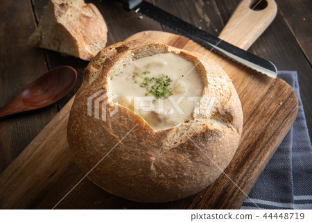 clam chowder in sour dough bread bowl clam chowder in sour dough bread bowl 44448719