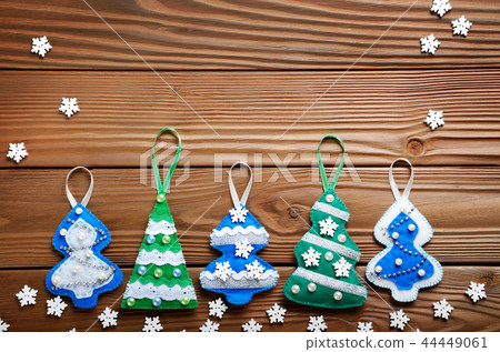 rustic green felt Christmas tree decorations 44449061