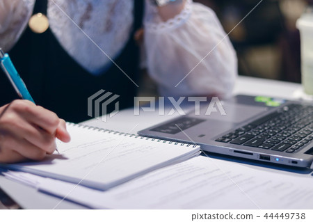 Women are working in the middle of the night. Women are working in the middle of the night. 44449738