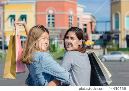 Group of young Asian woman shopping in market. 44450566
