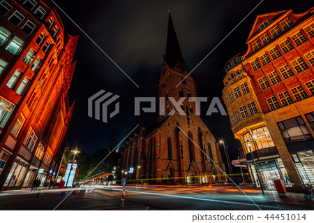 Night photography of Hamburg on the crossroad. View of St. Petri church and traditional red brick 44451014