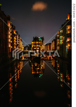 Hamburg, Germany. View of Wandrahmsfleet at dusk illumination light with reflection in the water 44451022