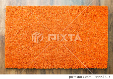 Blank Orange Welcome Mat On Wood Floor Blank Orange Welcome Mat On Wood Floor 44451803