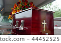 funeral casket in a hearse or chapel 44452525